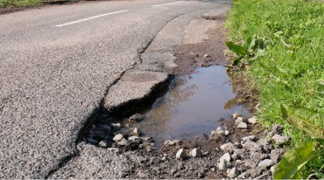 pothole on the rural uk road